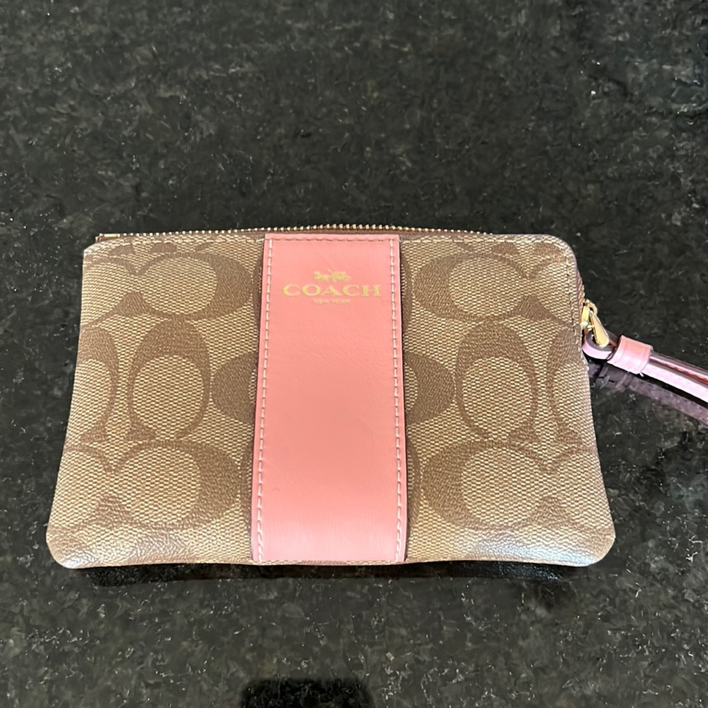 Coach wristlet with pink detail